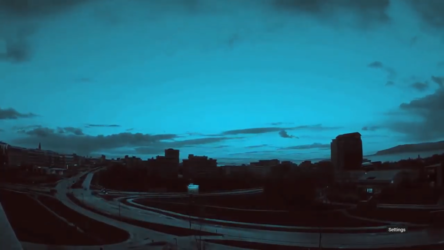 Coming Down A scenic view of a city with a blue sky