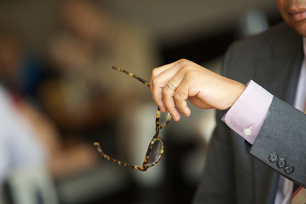 A man holding glasses