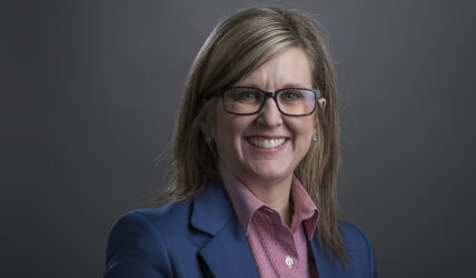 An executive portrait of a woman posing for a photo