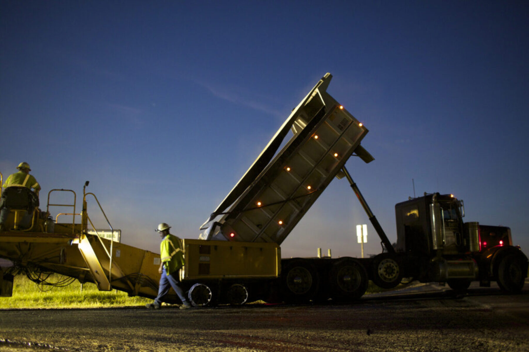 Boxley employees and a Boxley Truck at Night